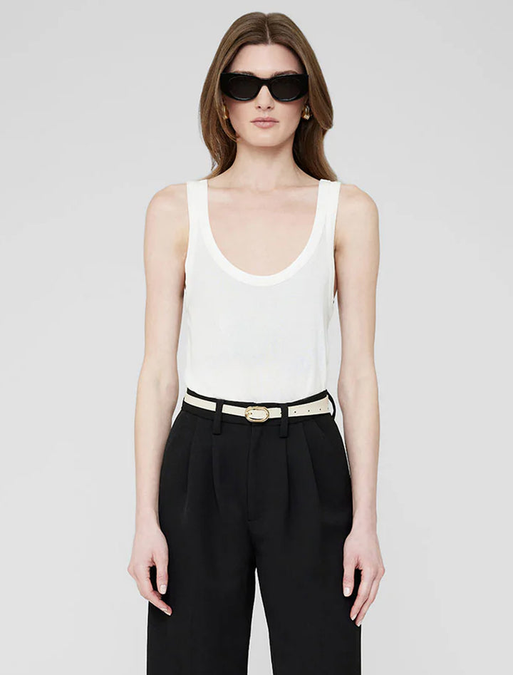 Model wearing Anine Bing's mini signature belt in ivory.