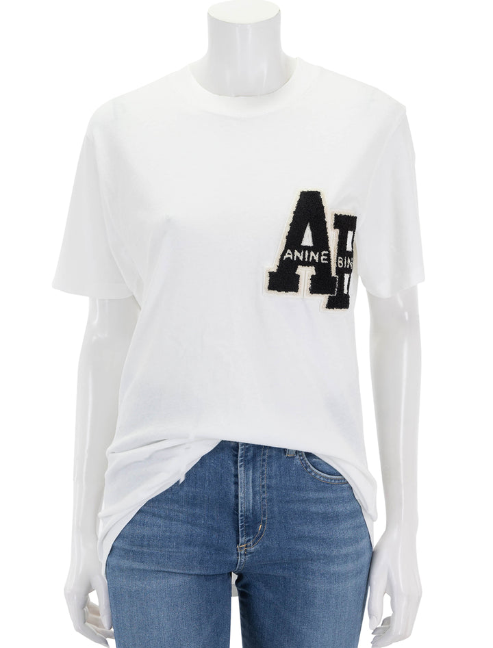 Front view of Anine Bing's lili letterman tee in off white.