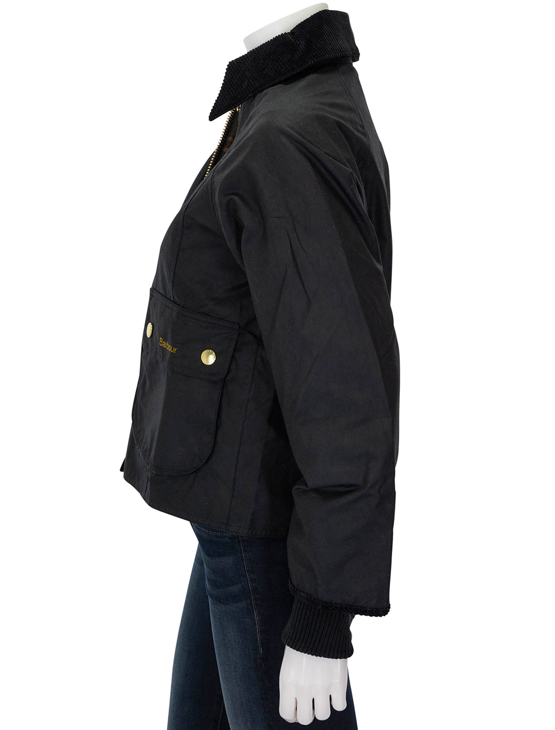 Side view of Barbour's cropped beadnell in black.