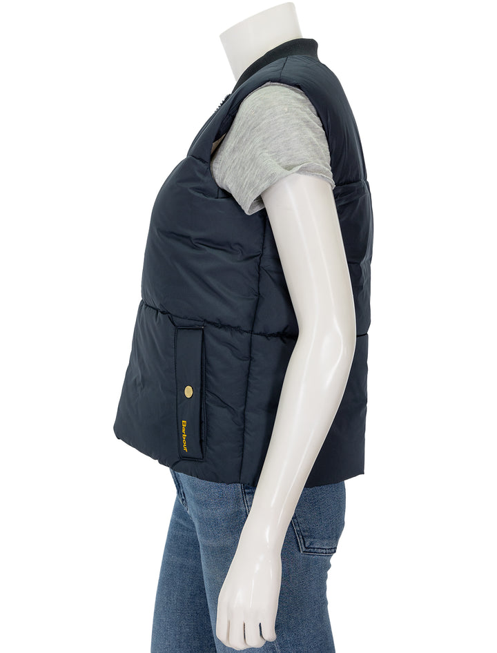 Side view of Barbour's fay gilet in dark navy.