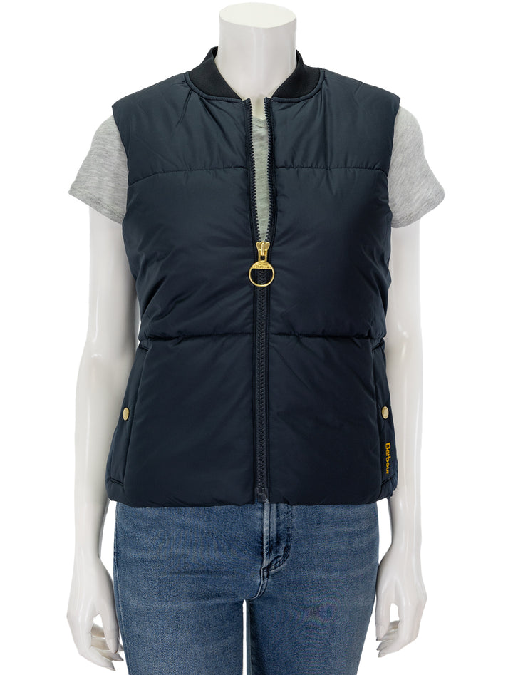 Front view of Barbour's fay gilet in dark navy, zipped.