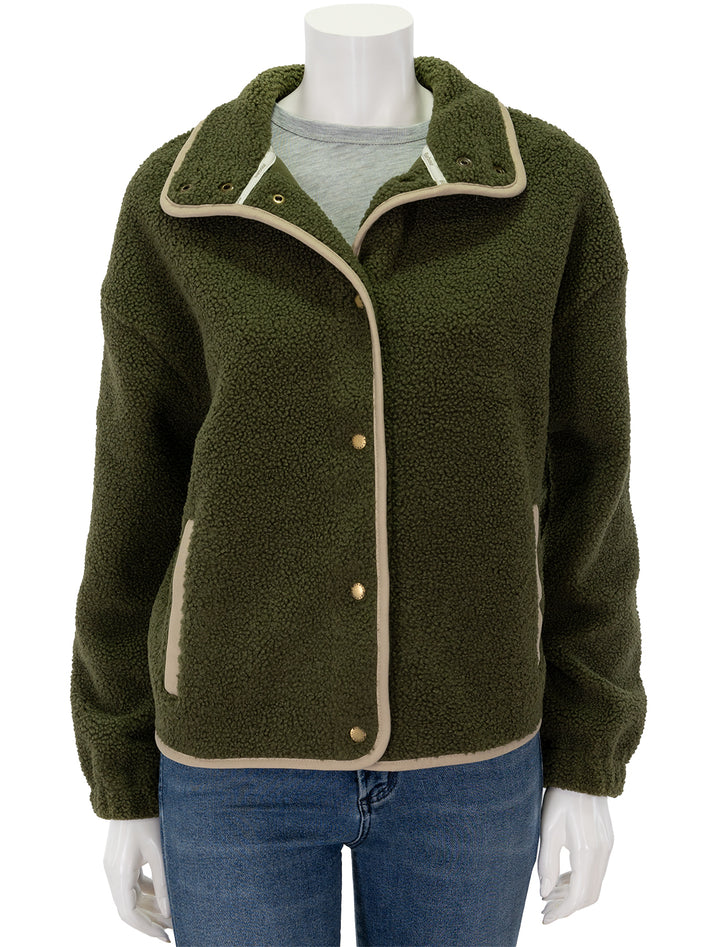 Front view of Barbour's violetta fleece jacket in dark moss, buttoned.