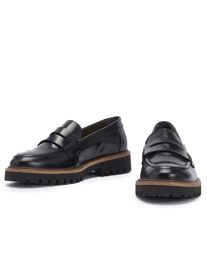 Alternative side view of Barbour's ludlow penny loafer in black polido.