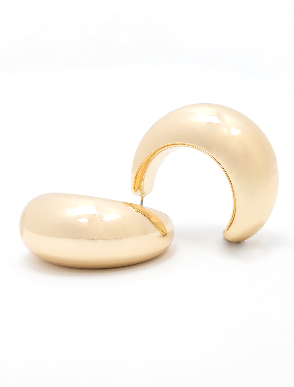 Laydown of AV Max's large puffy hoops in gold.