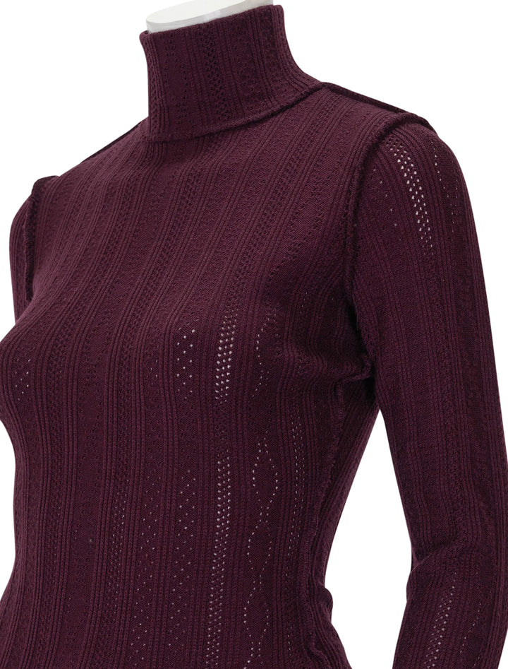 Close-up view of Smythe's pointelle turtleneck in plum.