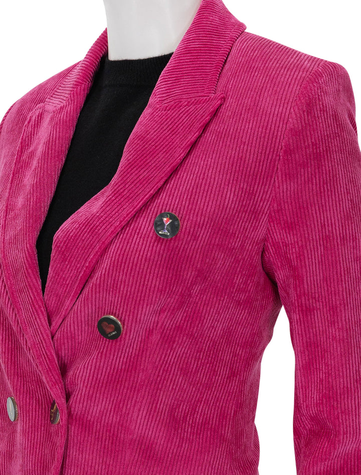 Close-up view of Vilagallo's ingrid pink corduroy blazer.