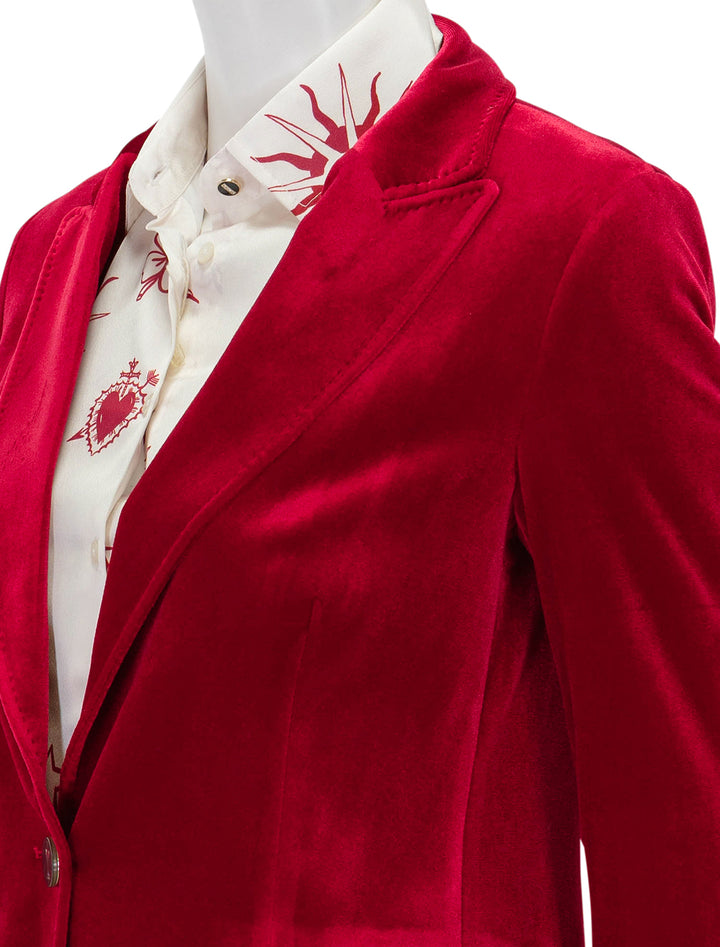 Close-up view of Vilagallo's sophia red velvet blazer.