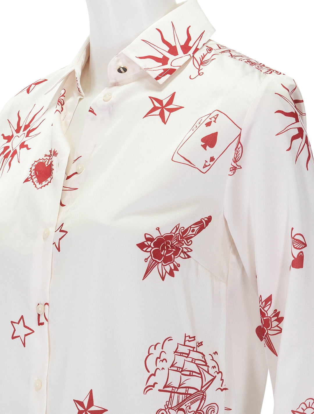 Close-up view of Vilagallo's alba tattoo print blouse.