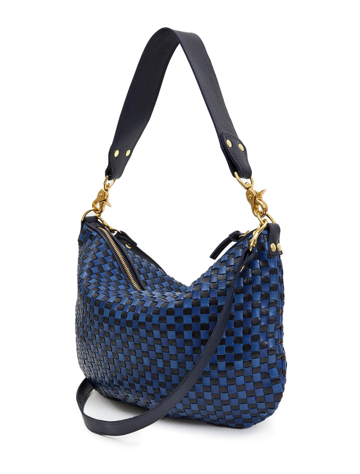 Back angle view of Clare V.'s moyen messenger in dark blue woven.