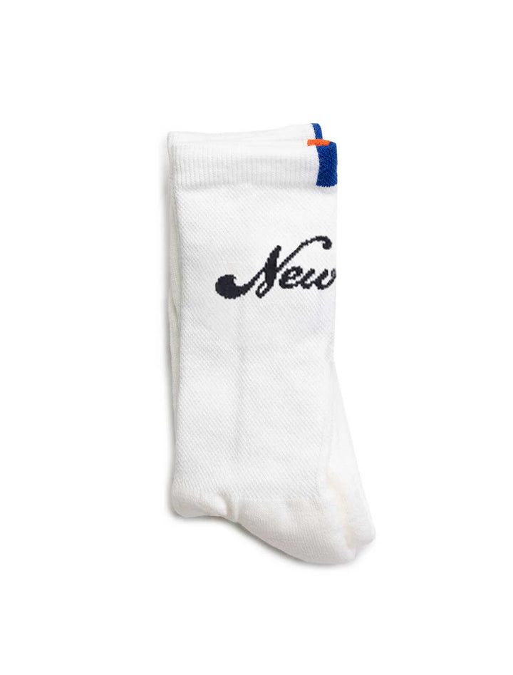 Close-up view of kule's new york socks in white.