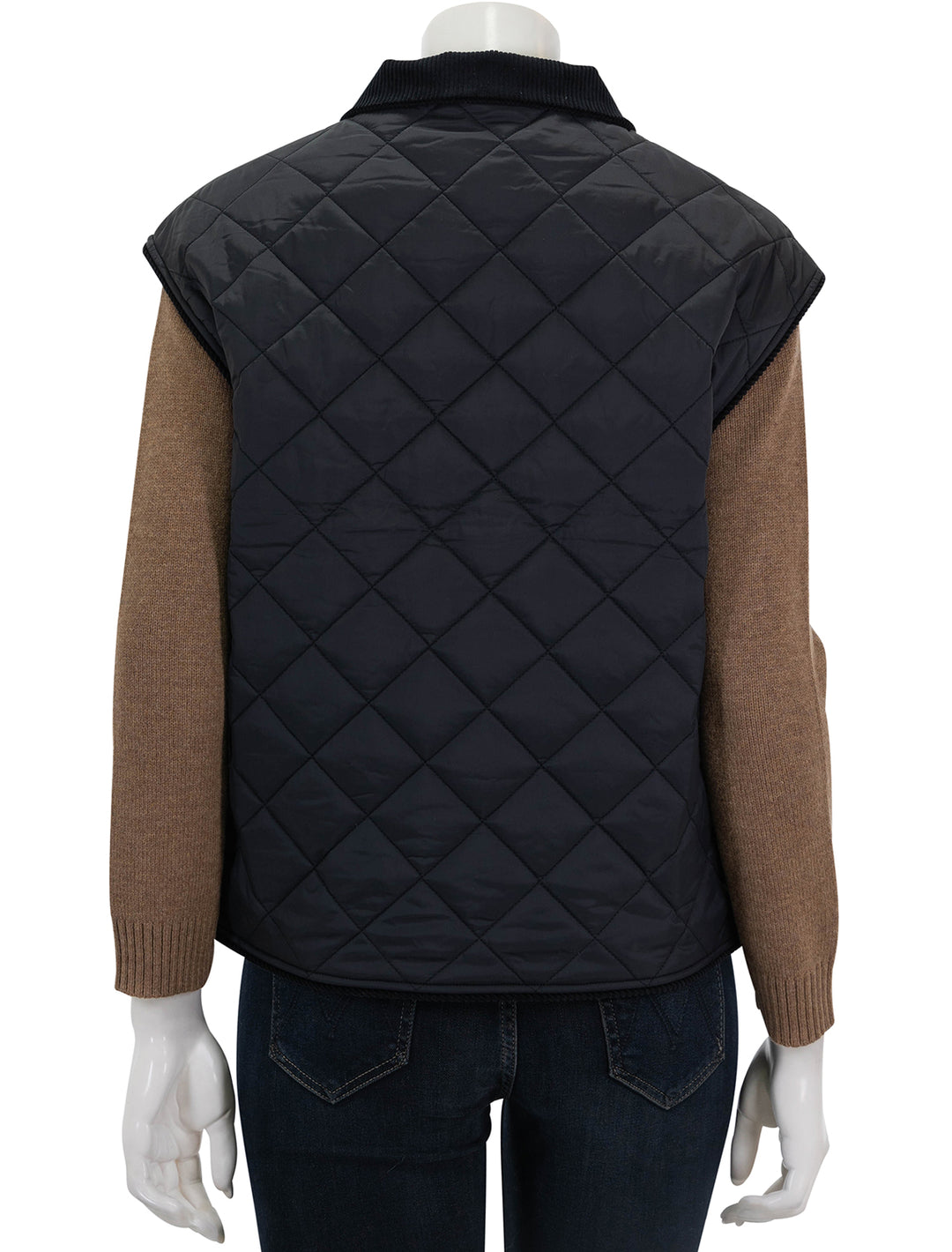 Back view of KULE's the rupert quilted vest in black.