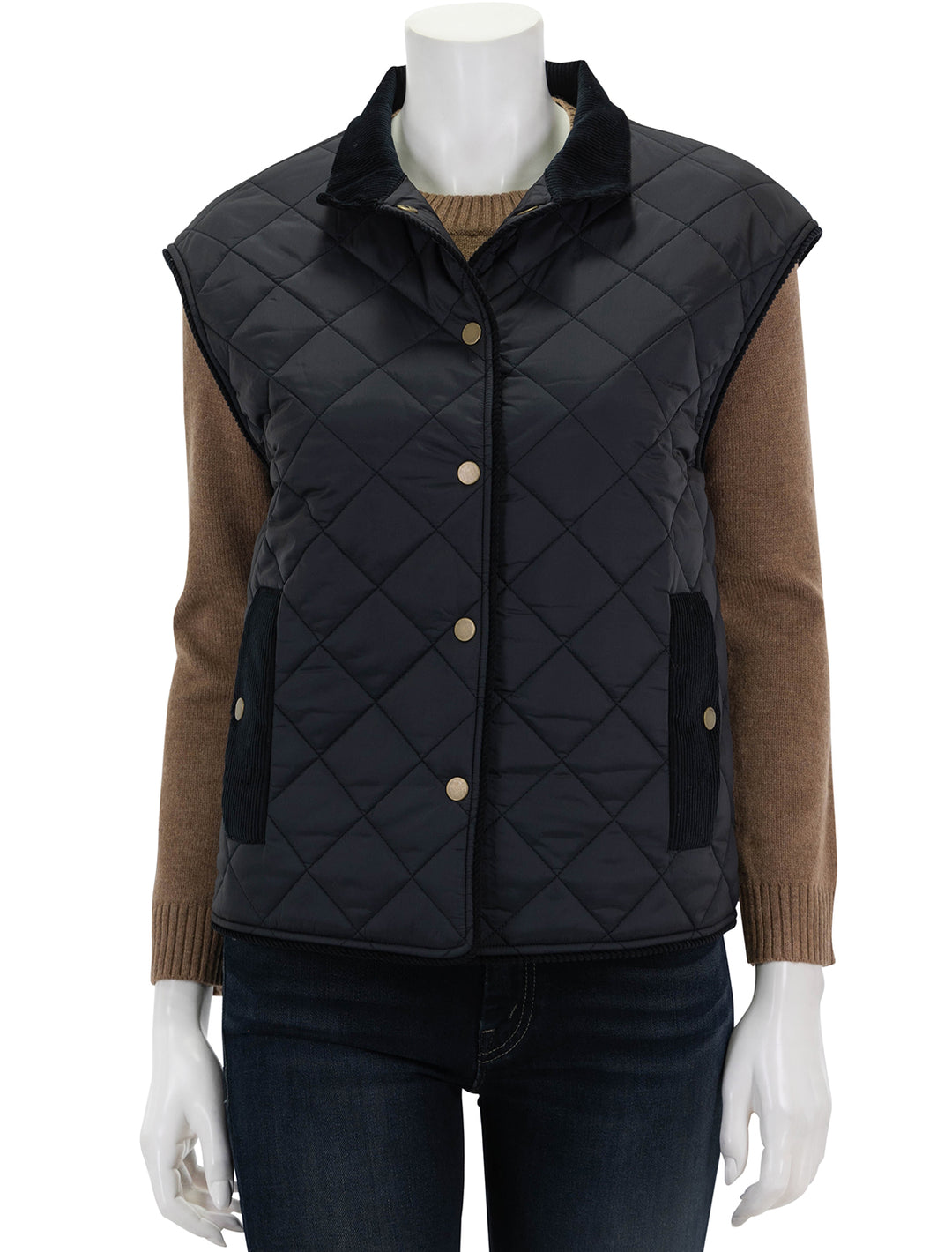 Front view of KULE's the rupert quilted vest in black, buttoned.