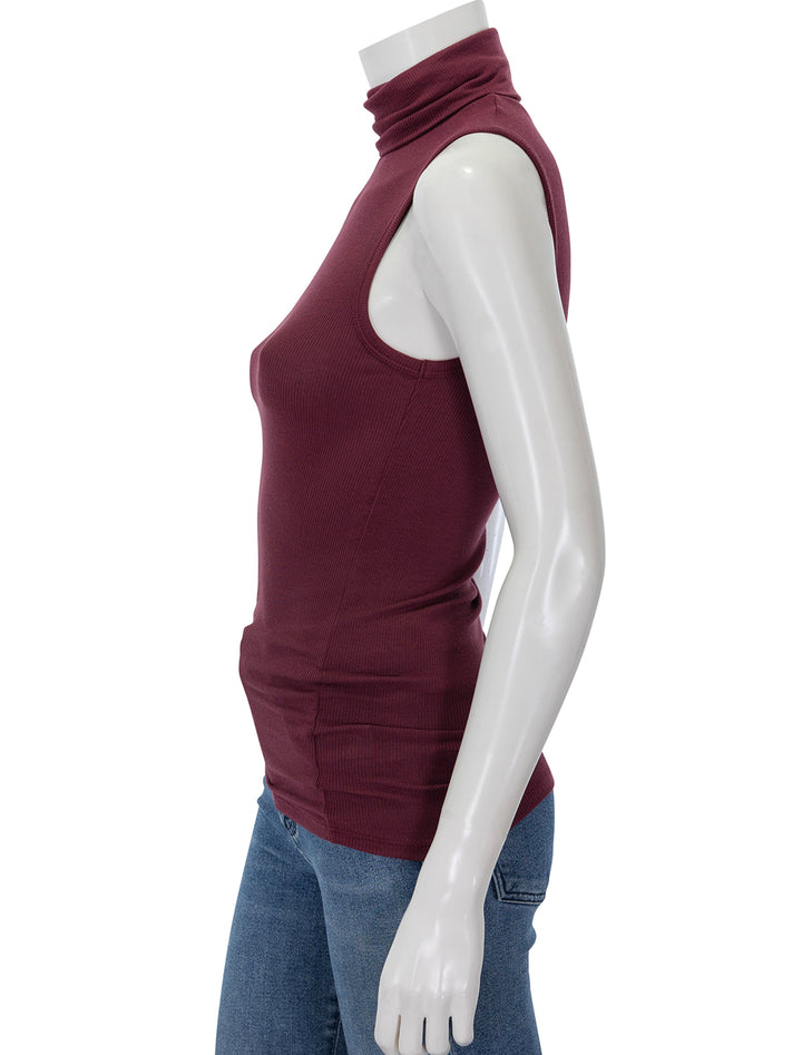 Side view of ATM's modal sleeveless turtleneck in merlot.