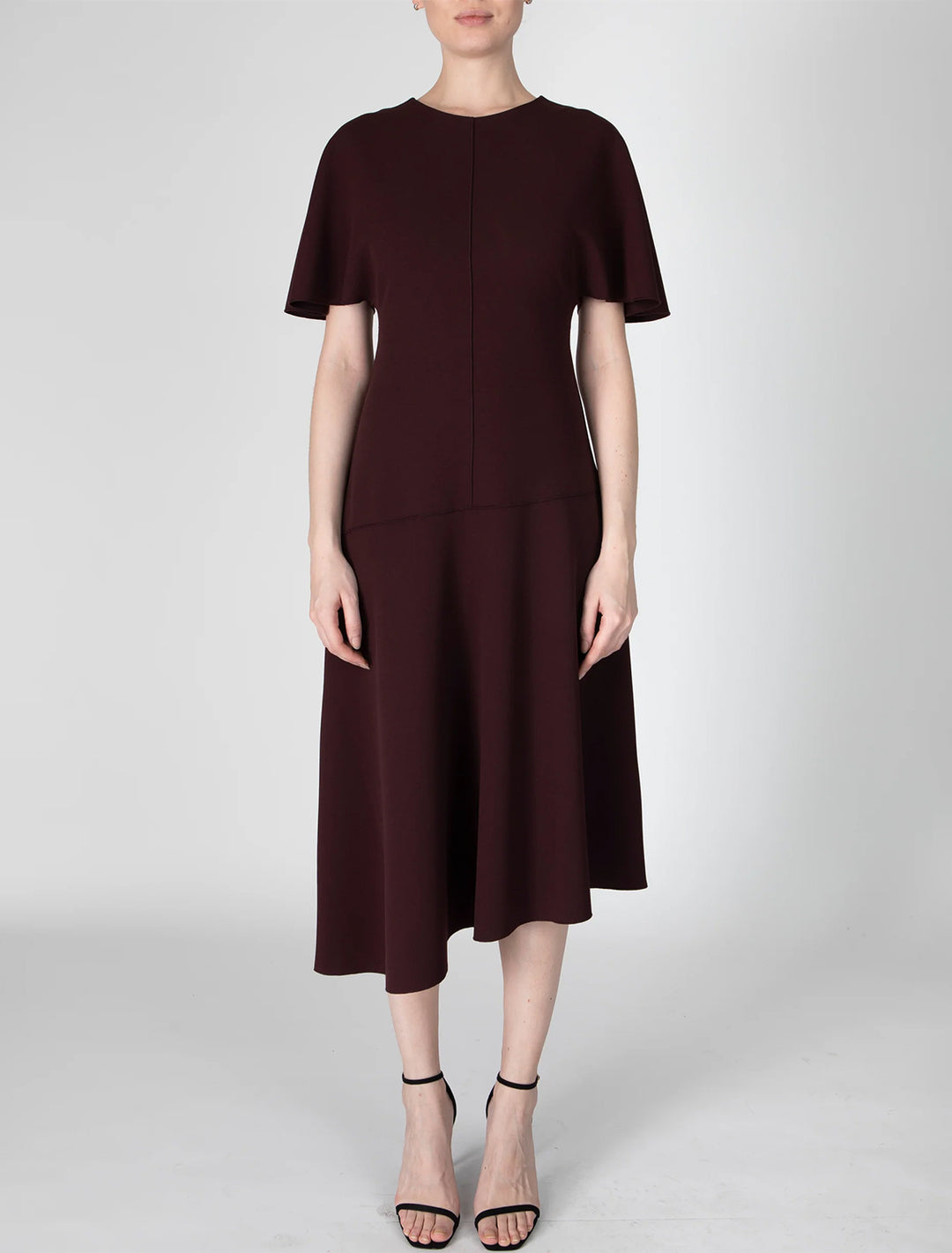 Model wearing Derek Lam 10 Crosby's Nicola Dress in Aubergine.