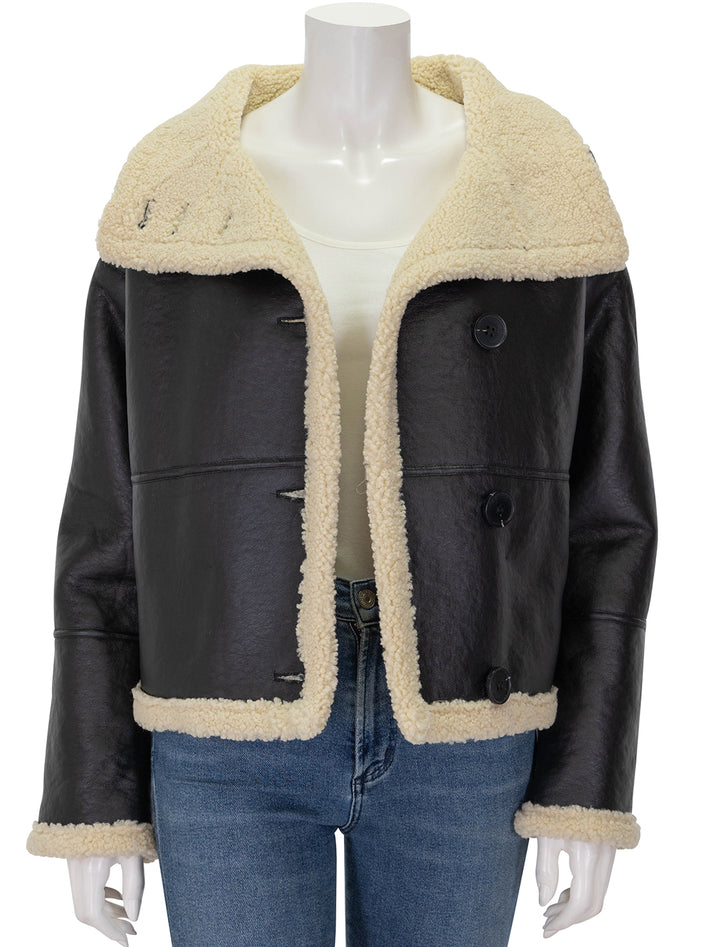 Front view of Suncoo Paris' Everest Faux Shearling in Noir, unbuttoned.