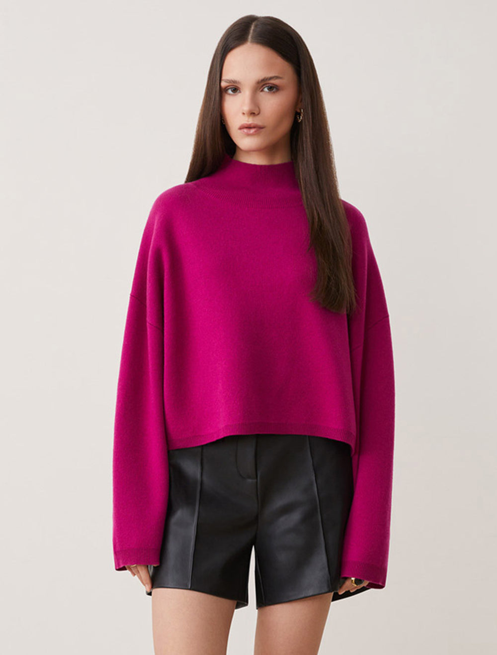 Model wearing Suncoo Paris' Pirmil Sweater in Fuchsia.