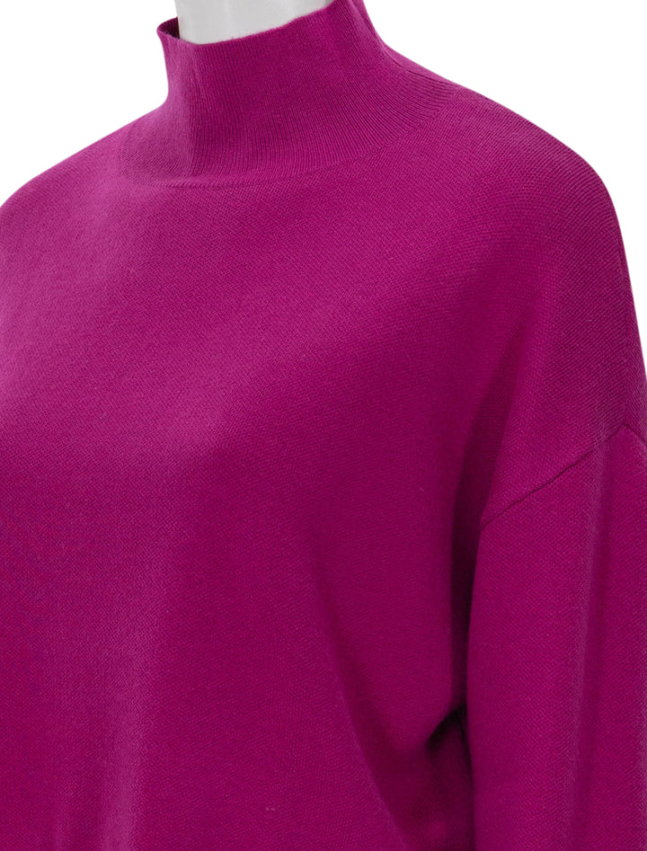 Close-up view of Suncoo Paris' Pirmil Sweater in Fuchsia.