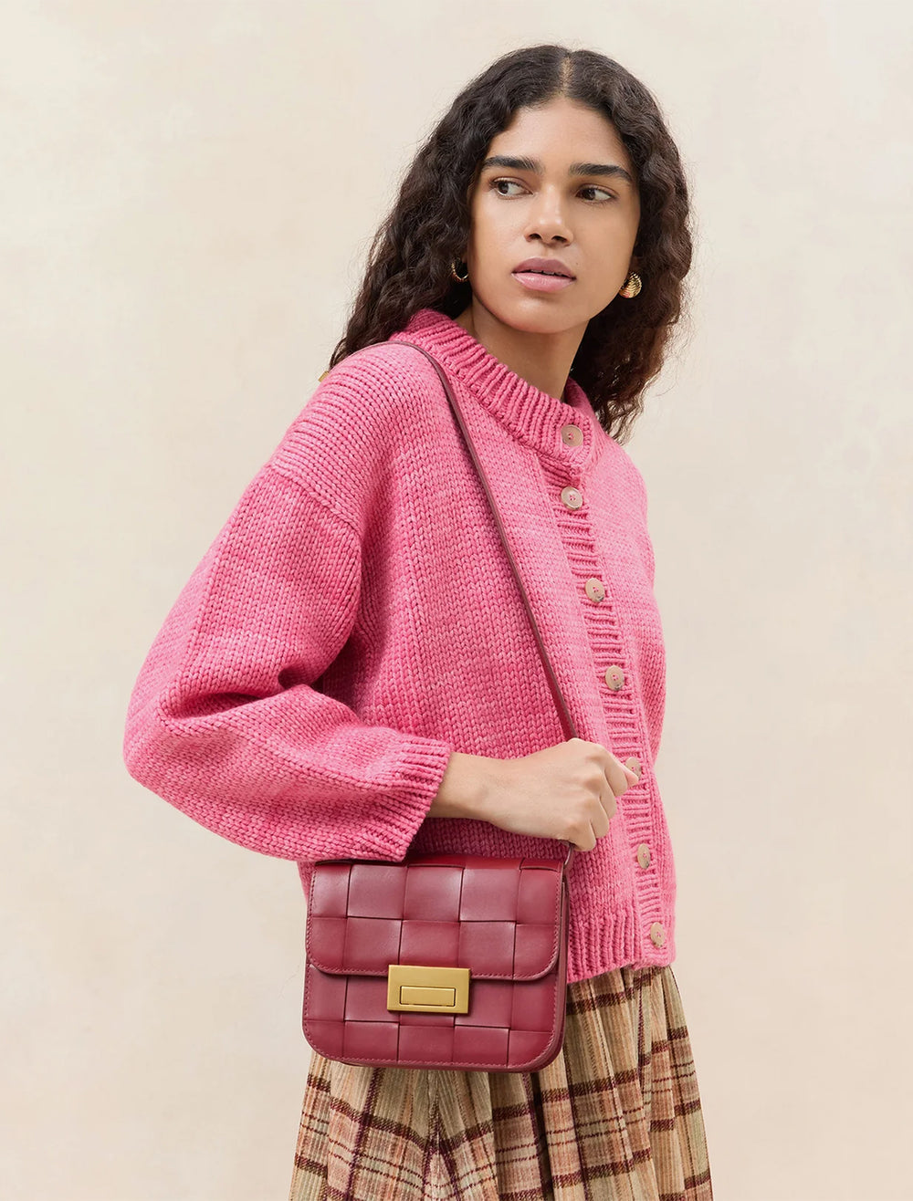 model wearing desi crossbody in woven wine