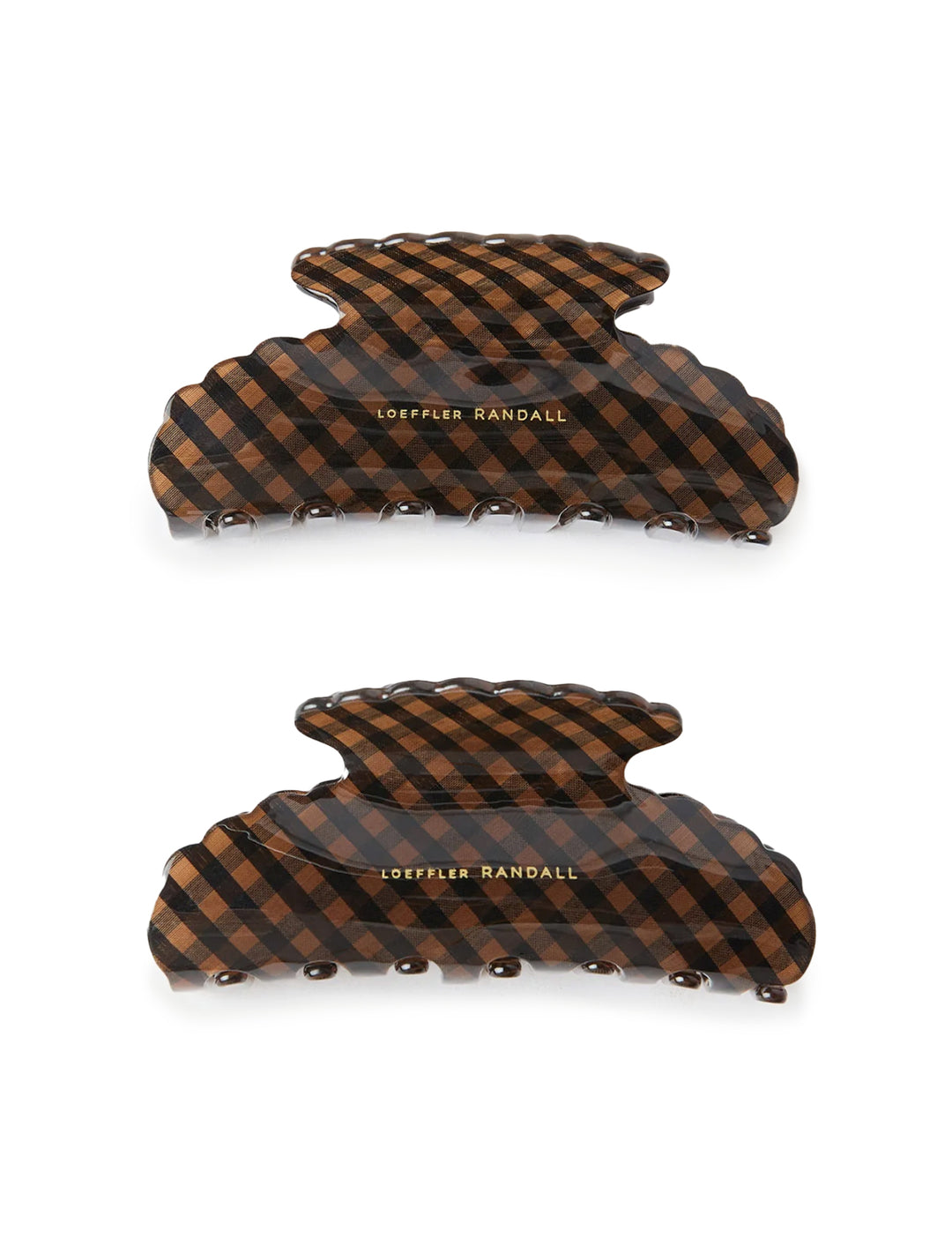 Overhead view of Loeffler Randall's yuri hair claw set in black and brown check.