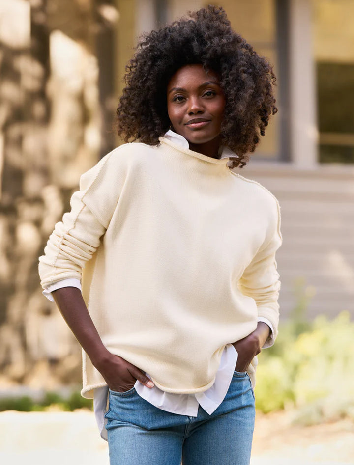 Model wearing Frank & Eileen's monterey sweater in cream.