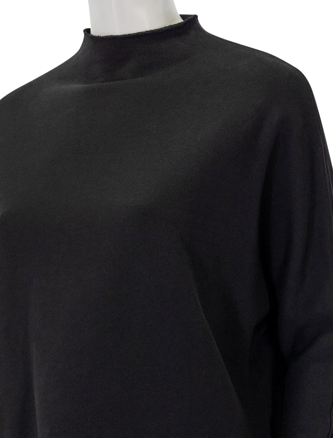 Close-up view of Frank & Eileen's effie funnel neck capelet in black.