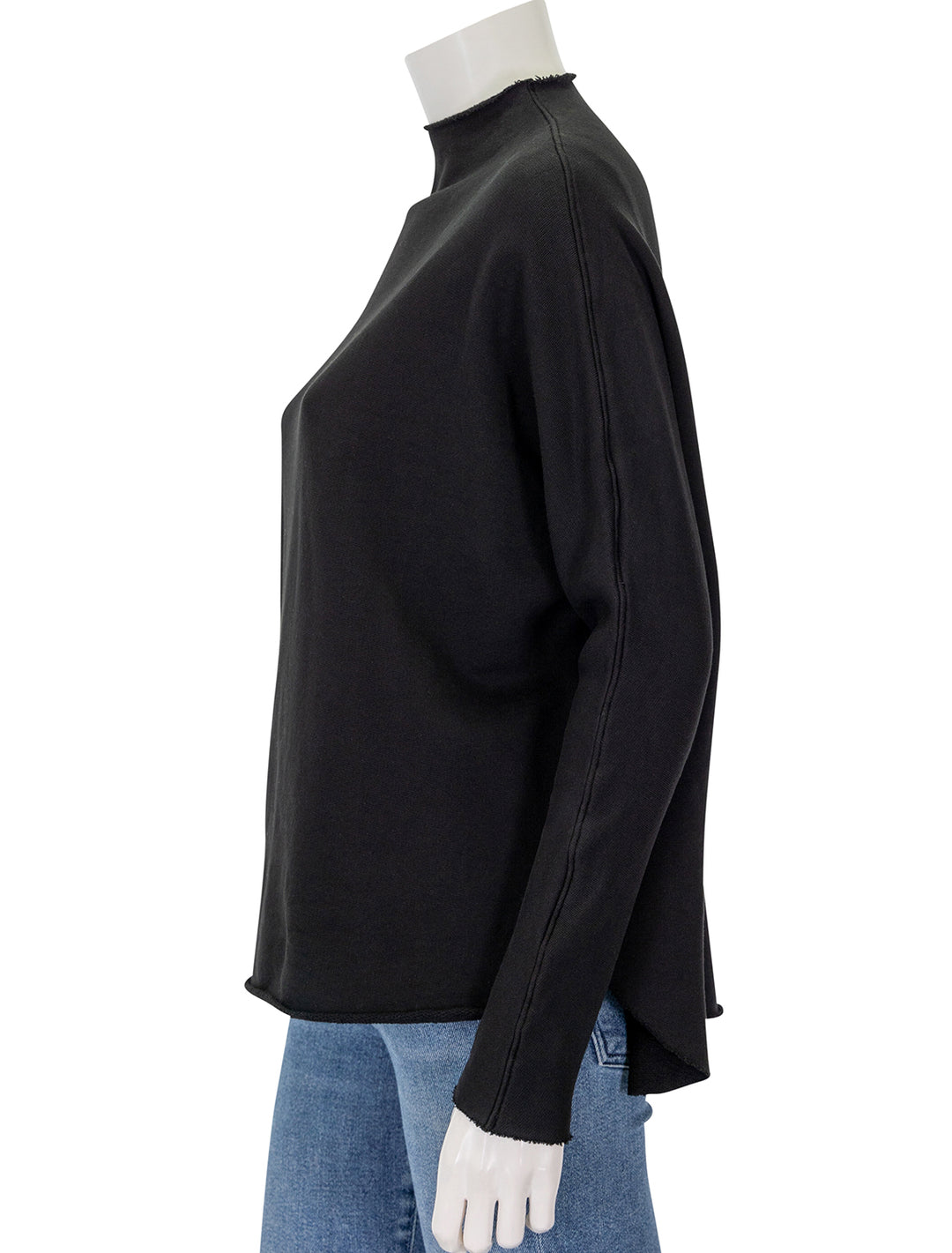 Side view of Frank & Eileen's effie funnel neck capelet in black.