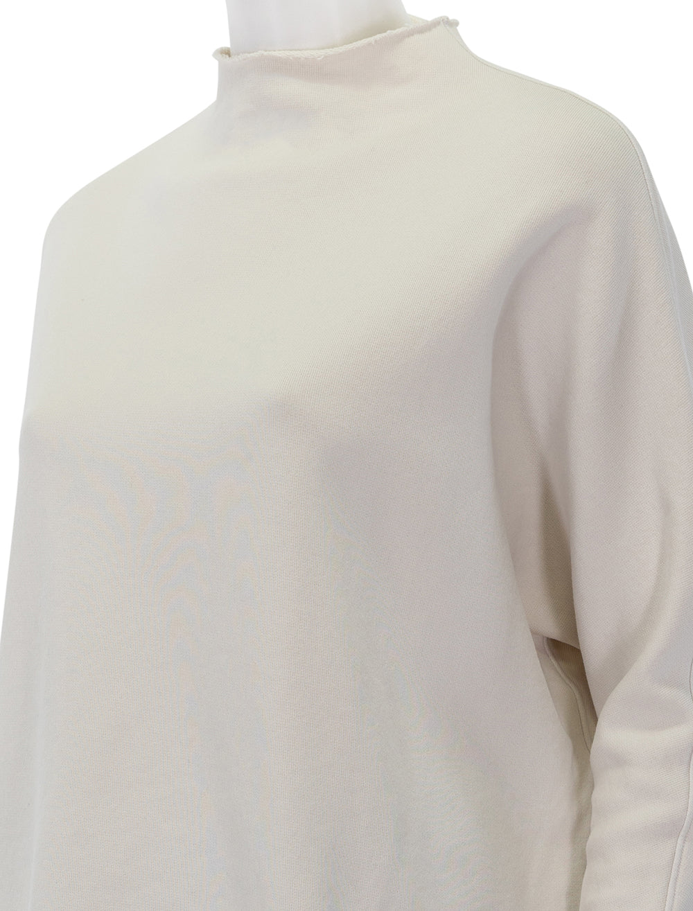 Close-up view of Frank & Eileen's effie funnel neck capelet in vintage white.