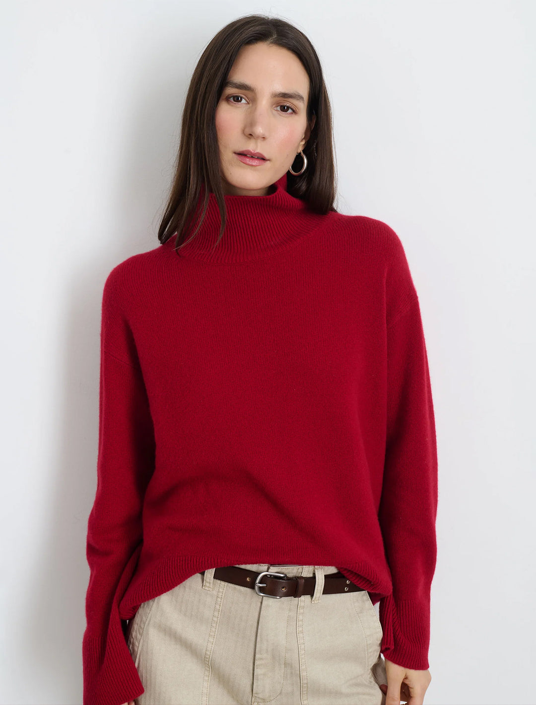 Model wearing Alex Mill's cecile turtleneck sweater in garnet.