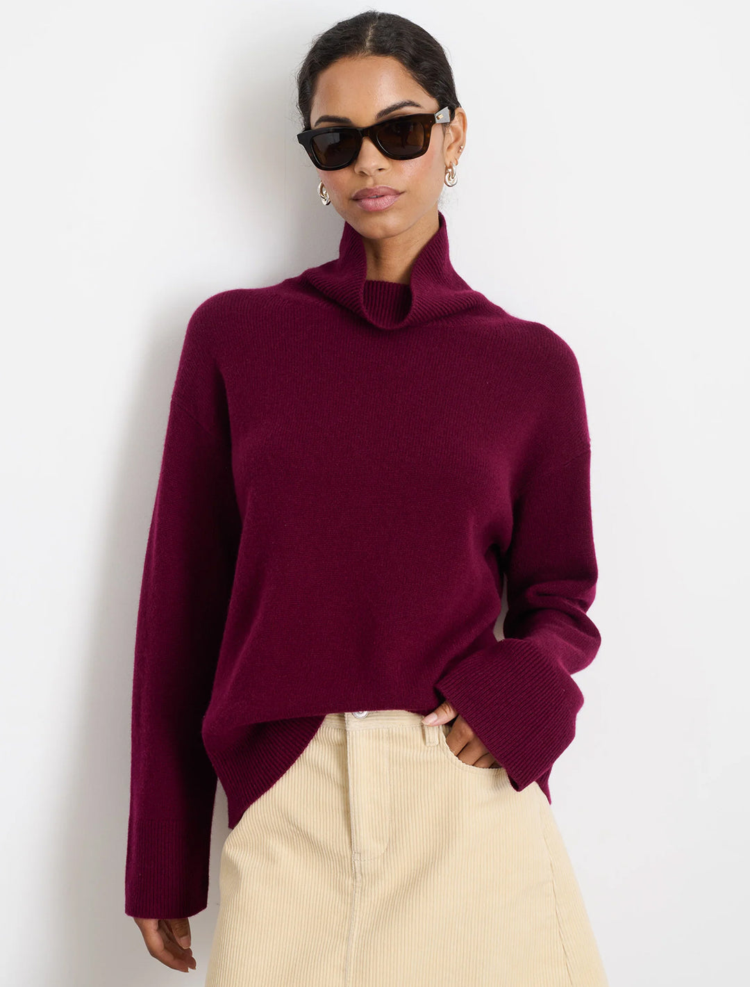 Model wearing Alex Mill's cecile turtleneck in barolo.