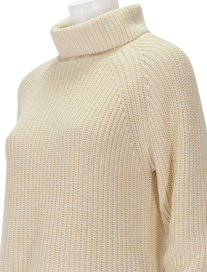 Close-up view of Alex Mill's nora turtleneck in cream.