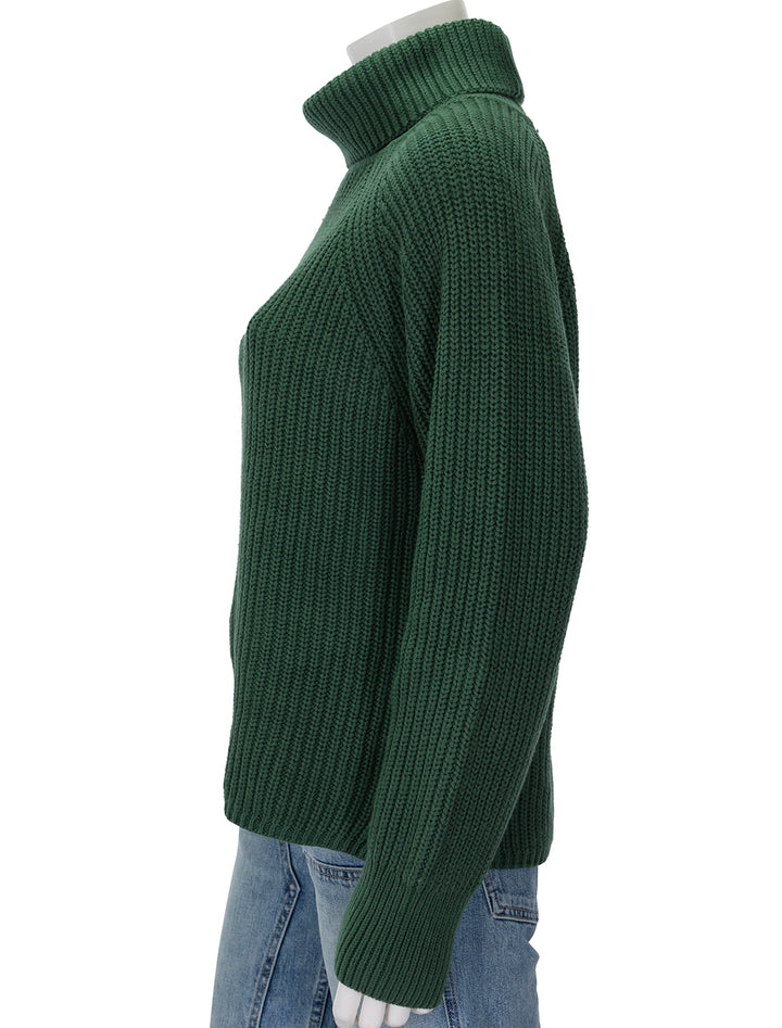 Side view of Alex Mill's nora turtleneck sweater in hunter green.