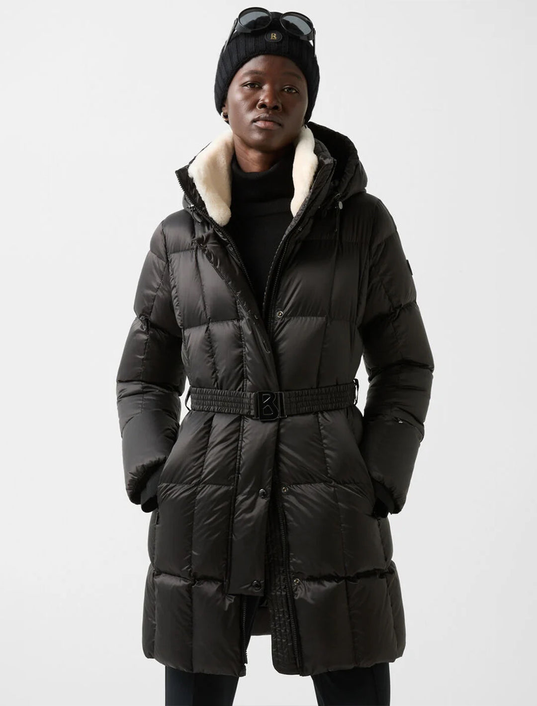 Model wearing Bogner's nicci in black with sherpa trim.