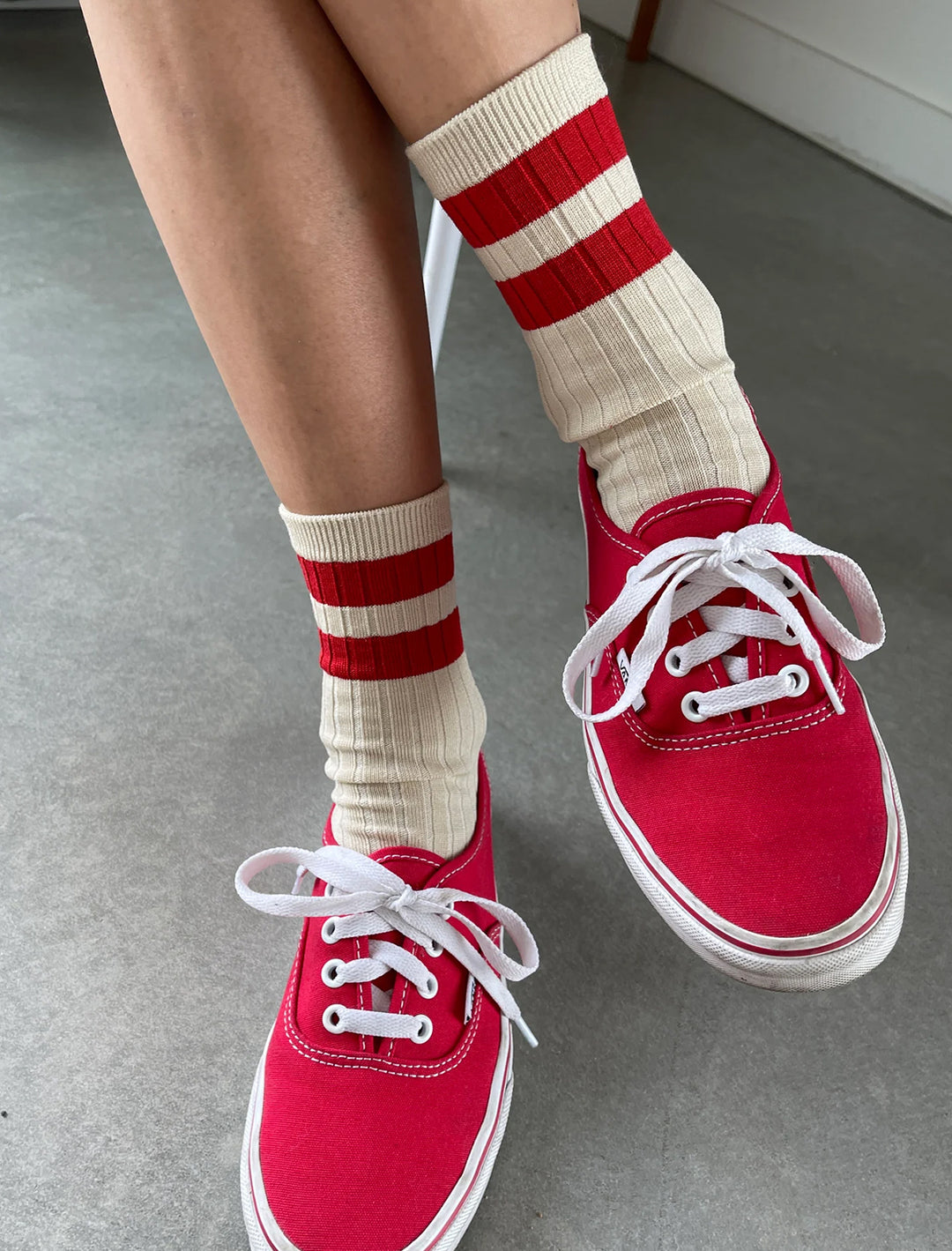 Model wearing Le Bon Shoppe's her socks varsity in red.