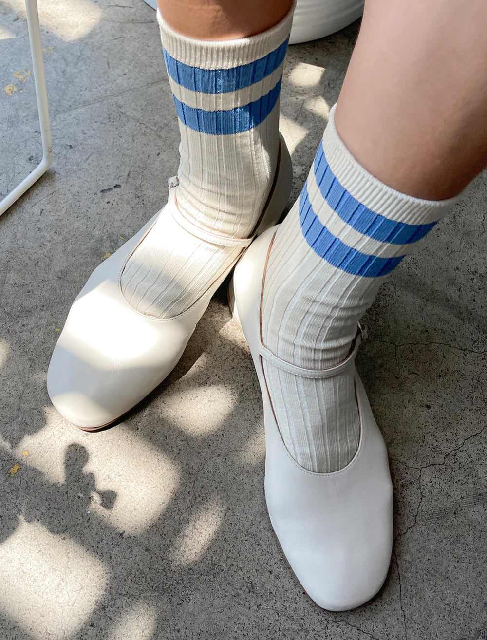 Model wearing Le Bon Shoppe's her socks varsity in blue.