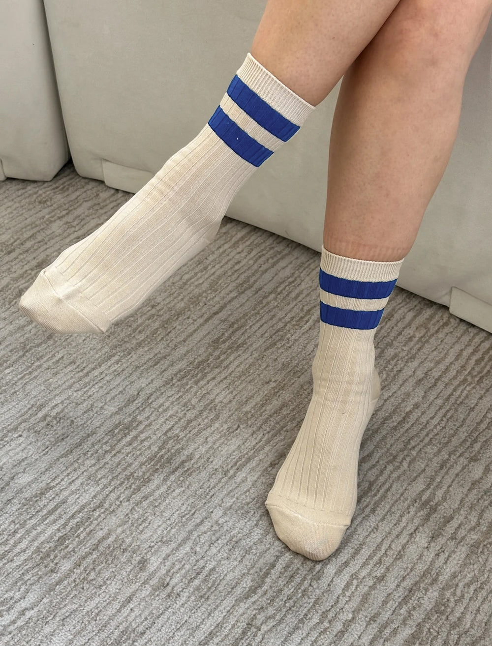 Model wearing Le Bon Shoppe's her socks varsity in azure.