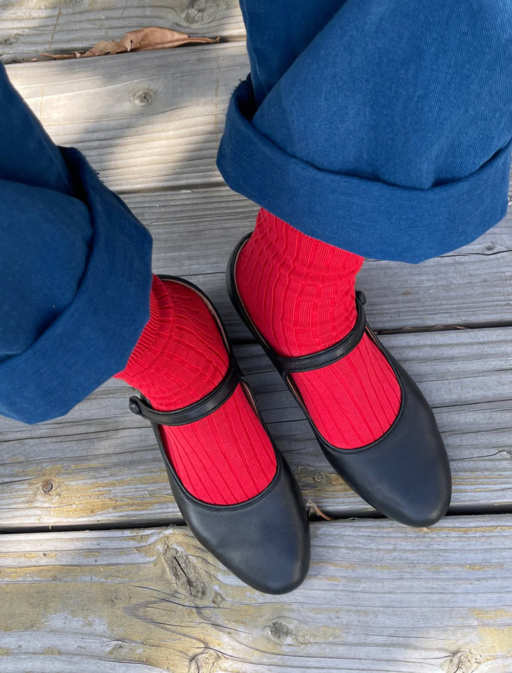 Model wearing Le Bon Shoppe's her socks in classic red.