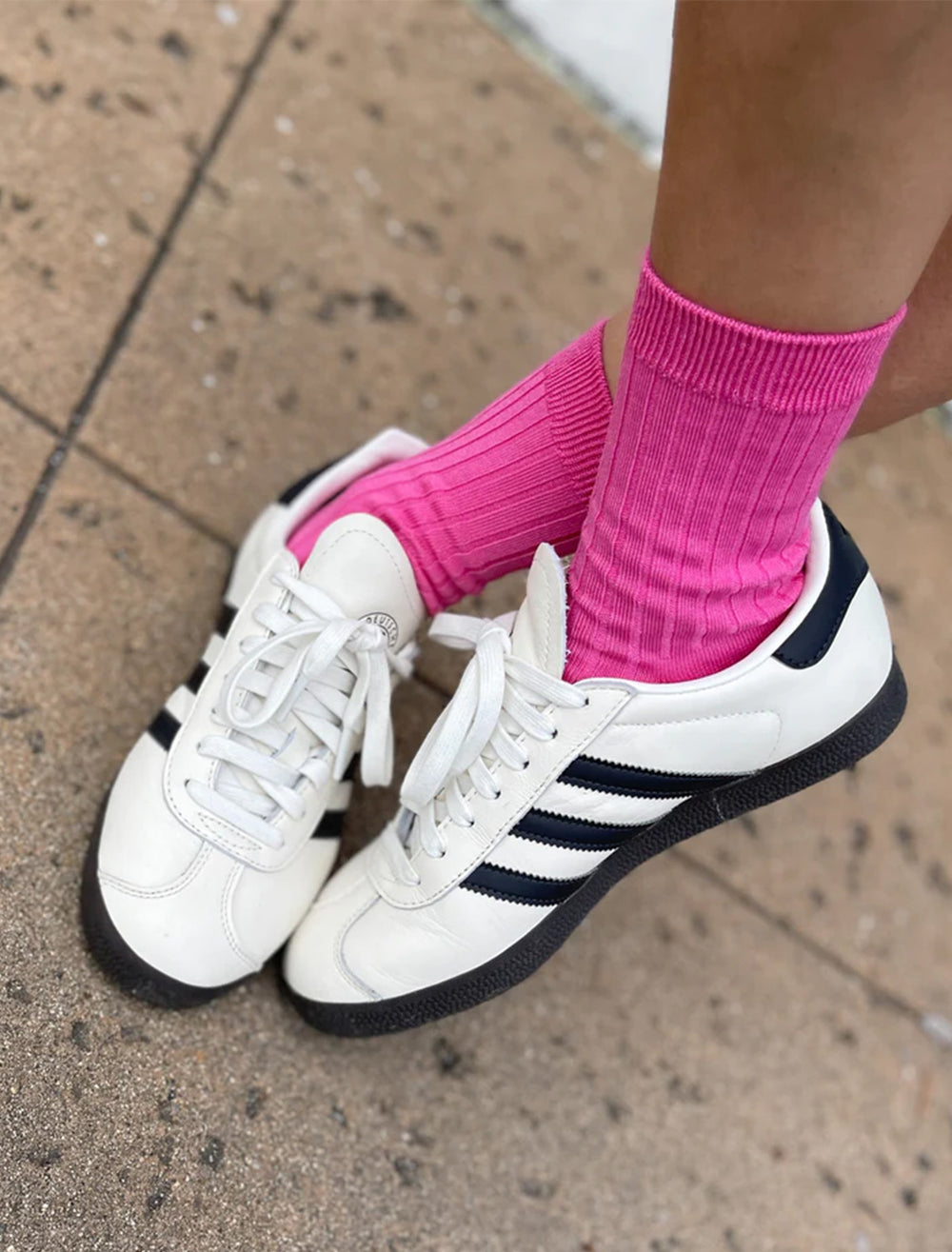 Model wearing Le Bon Shoppe's her socks in bright pink.
