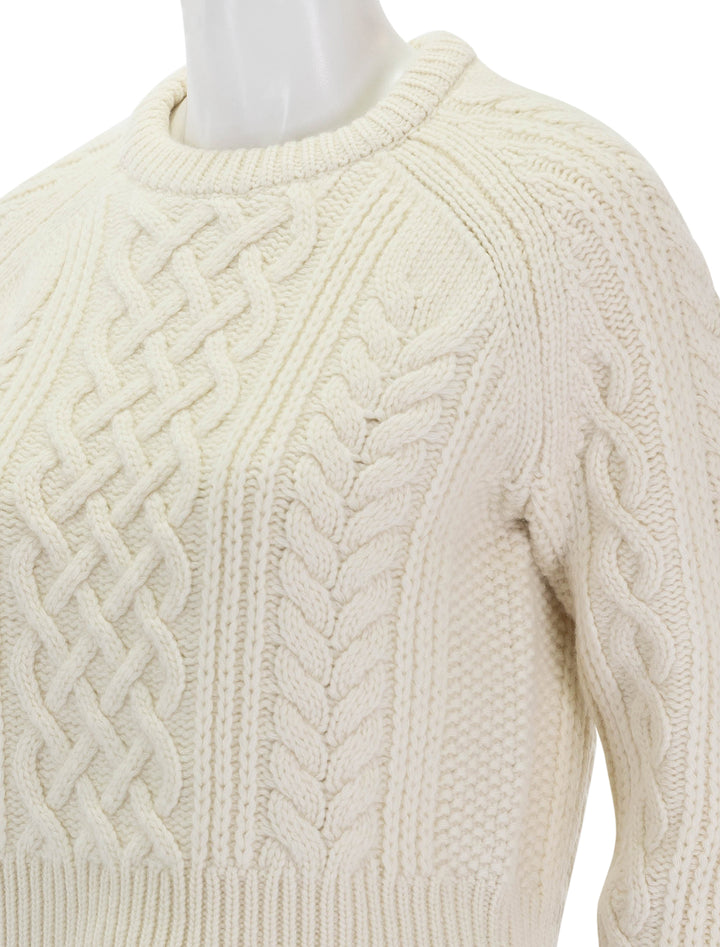 Close-up view of Nili Lotan's coras sweater in ivory.