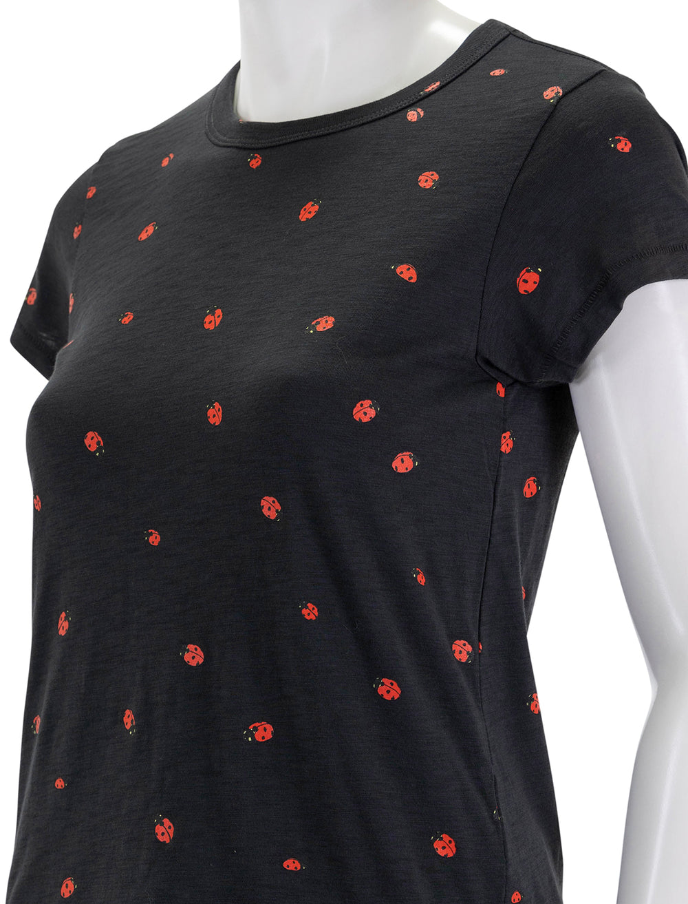 Close-up view of Rag & Bone's all over ladybug tee in black.