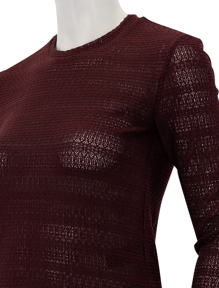 Close-up view of Rag & Bone's julia long sleeve knit in dark purple.