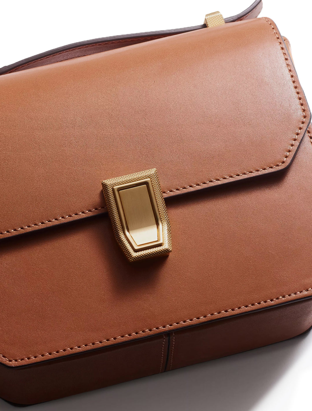 Close-up view of Rag & Bone's max small crossbody in tan.