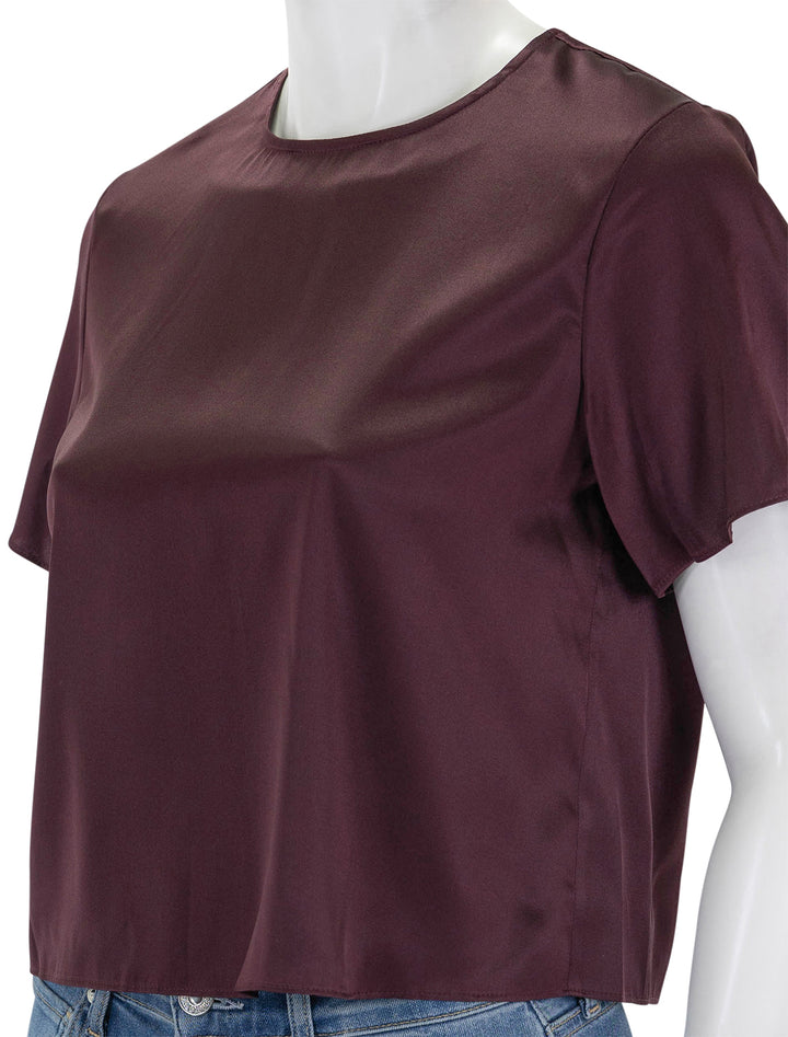 Close-up view of STAUD's strand top in merlot.