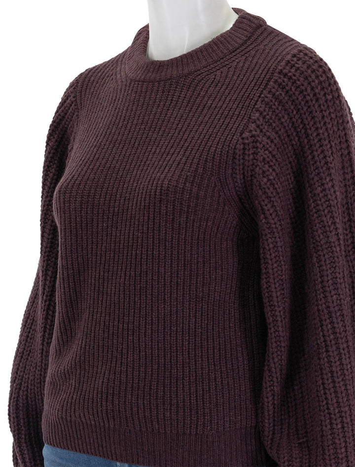 Close-up view of STAUD's aura sweater in merlot.