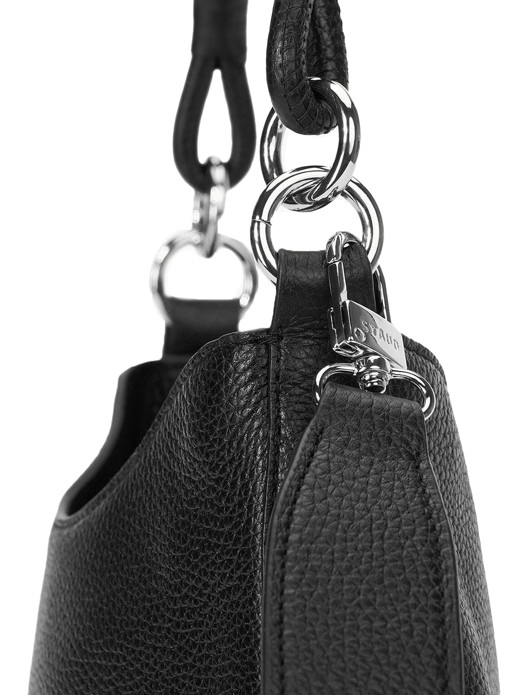 Close-up view of Staud's mel shoulder bag in black.