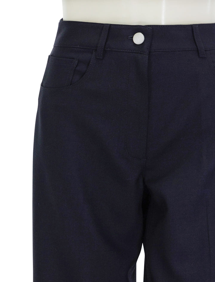 Close-up view of Theory's clean 5 pocket pant in dark navy.