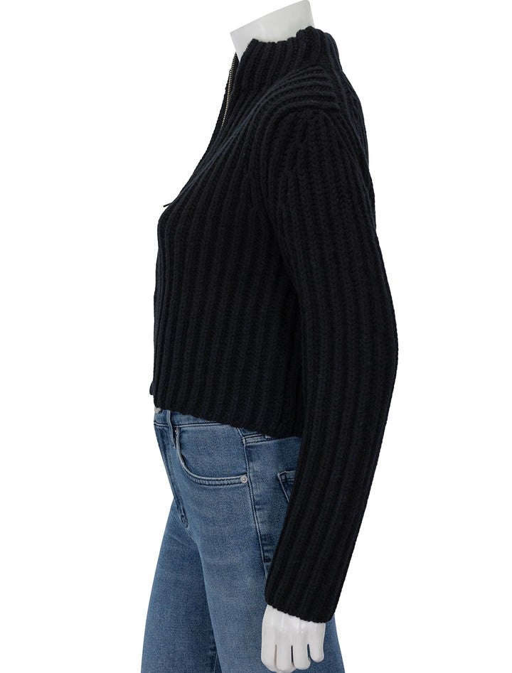 Side view of Theory's zip up cardigan in black.