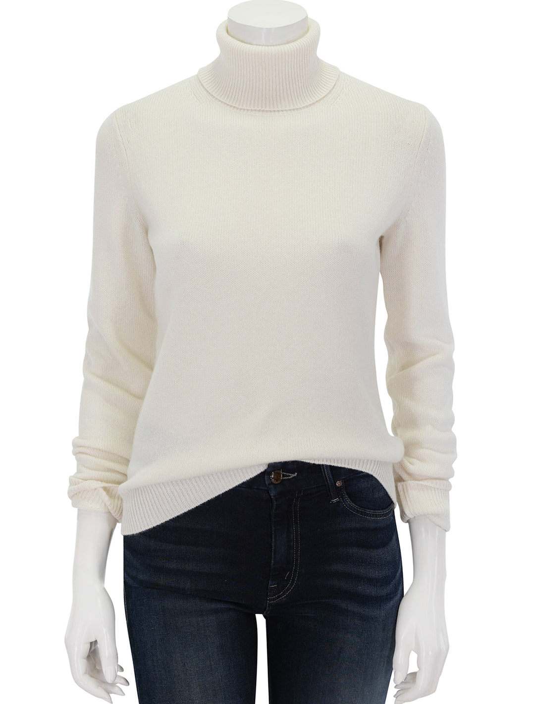 Front view of Theory's classic cashmere turtleneck in ivory.