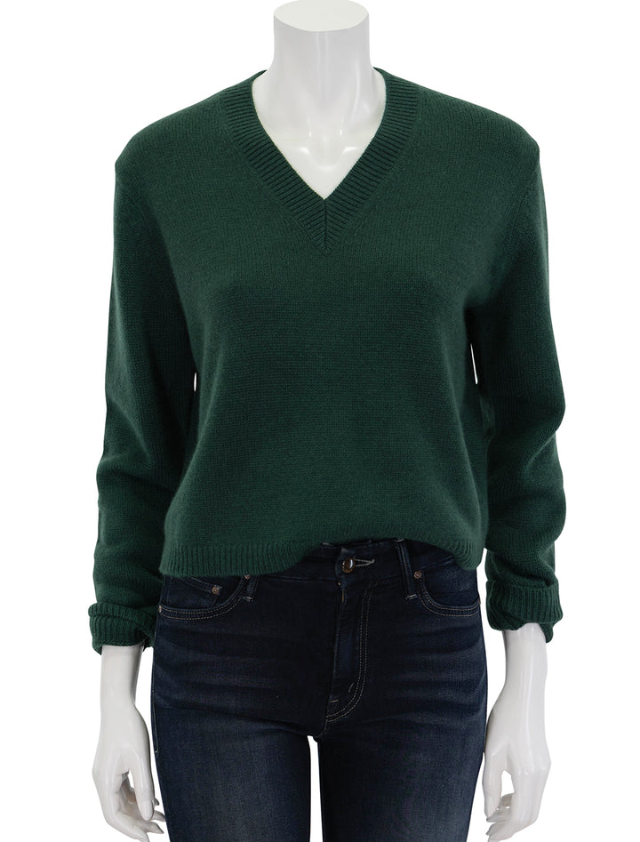 Front view of Theory's cropped vneck pullover in hunter green.