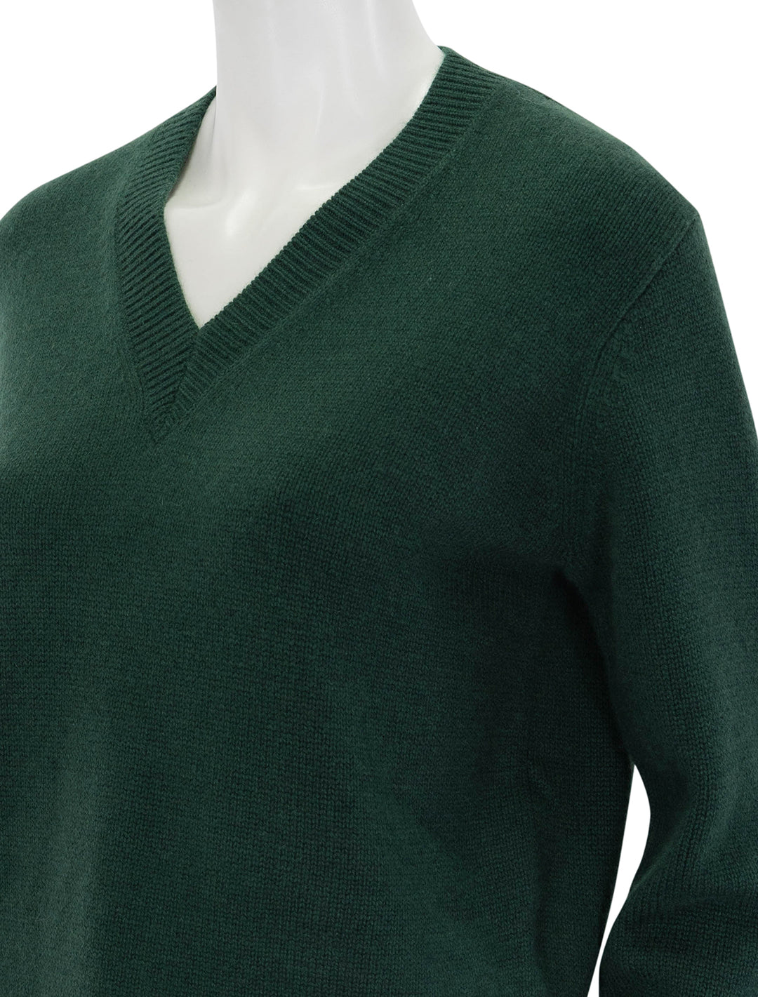 Close-up view of Theory's cropped vneck pullover in hunter green.