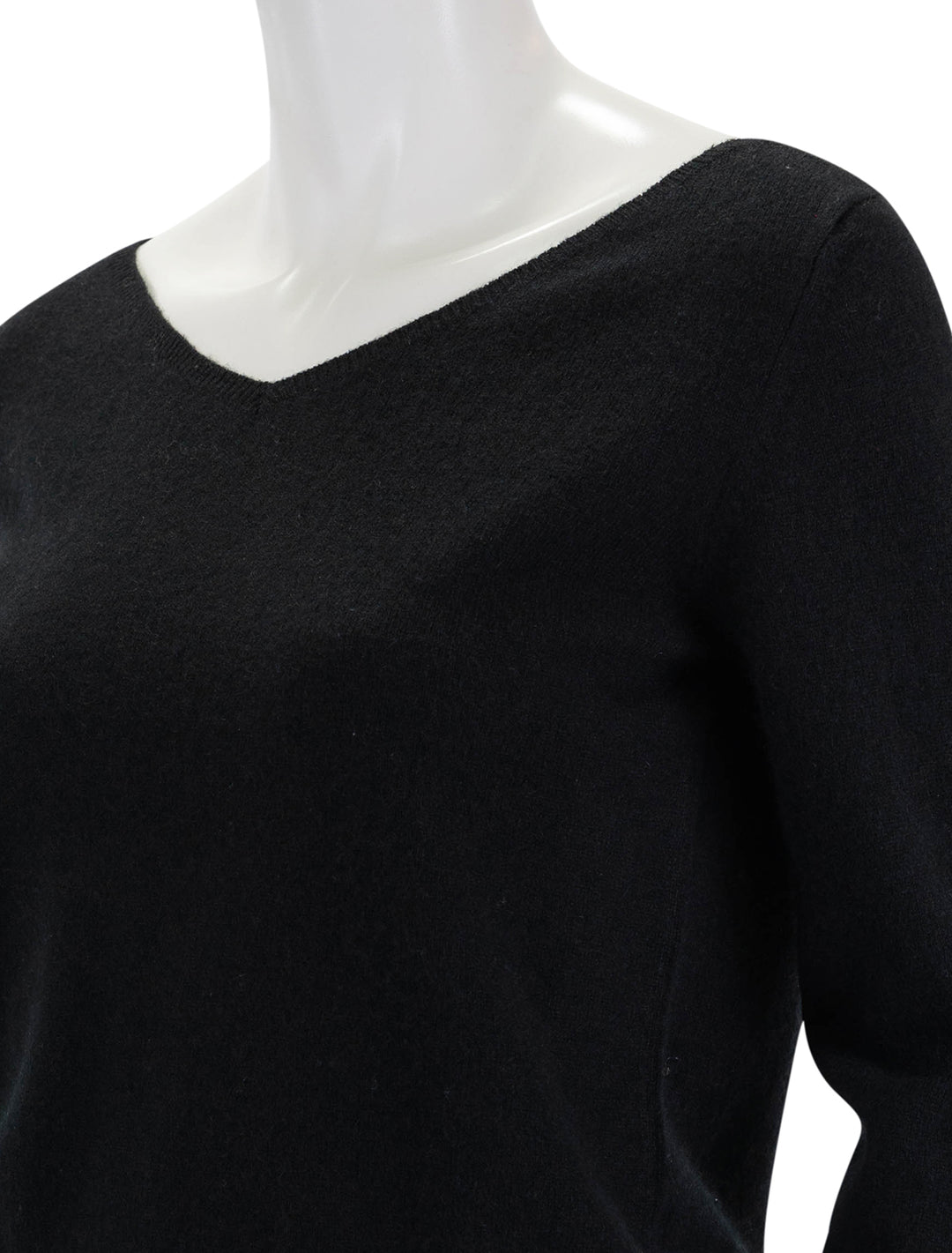 close up view of joan vee neck sweater in black